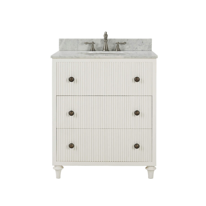 White bathroom vanity with marble countertop and bronze fixtures on a white background