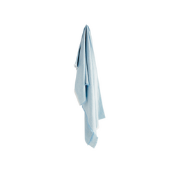 Light blue towel hanging on a white wall